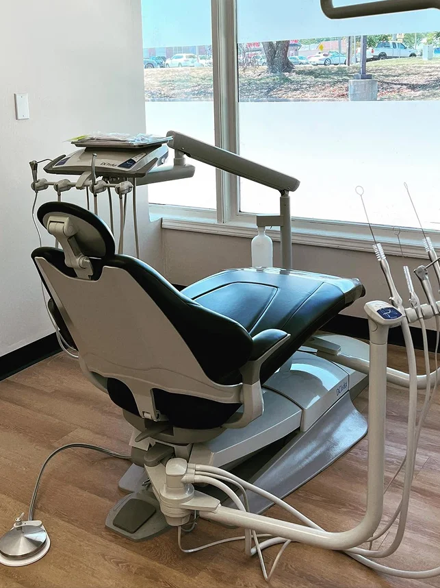 Modern dental treatment room with dental chair