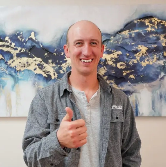 Bald man smiling with sparkling clean teeth for teeth whitening
